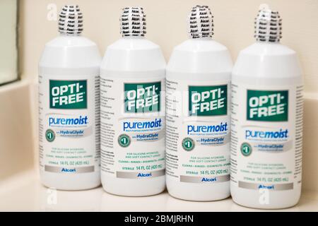 Princeton New Jersey May 9 2020: bottle of Opti Free Pure Moist Multi-Purpose Disinfecting Solution for Contact Lenses. - Image Stock Photo