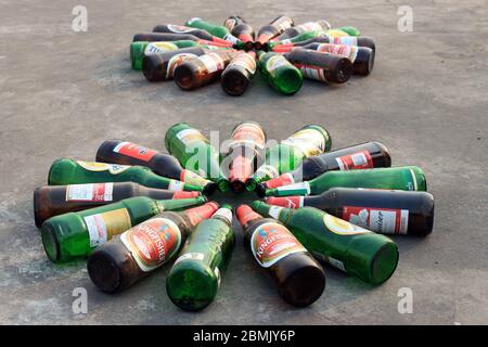 Kolkata, West Bengal on 24th March in 2016 : Empty beer bottle on the floor. Huge demand of beer during lock down for covid19 virus. Stock Photo