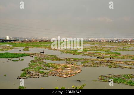 View of the Makoko suburb next to the Lagos lagoon from a highway bridge. Stock Photo