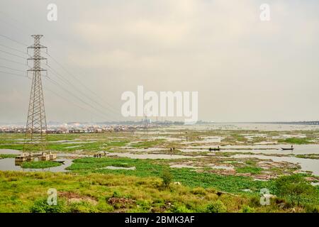 View of the Makoko suburb next to the Lagos lagoon from a highway bridge. Stock Photo