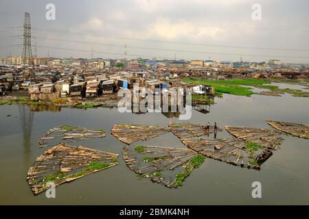 View of the Makoko suburb next to the Lagos lagoon from a highway bridge. Stock Photo