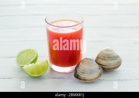 caldo de almeja, consome de almejas, clam cocktail with lemon and salted cookies mexican sea food in mexico Stock Photo