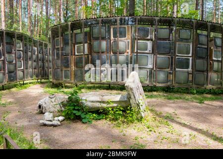 The famous sculpture by Gintaras Karosas, made of hundreds of old, Soviet era TV sets. In the foreground is a topple, marble statue of Lenin. At Europ Stock Photo
