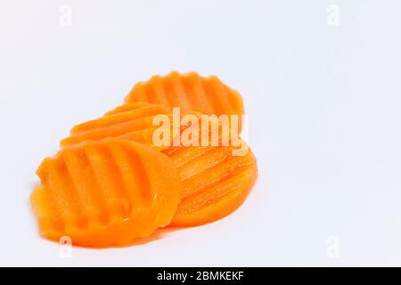 wok sliced carrots on white background Stock Photo