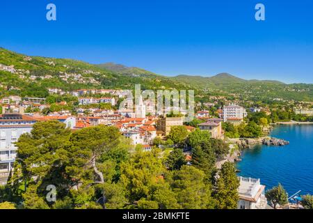 Croatia, beautiful town of Lovran and Lungomare sea walkway, aerial panoramic view in Kvarner bay coastline Stock Photo