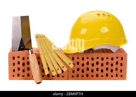 brick and tools for house construction Stock Photo