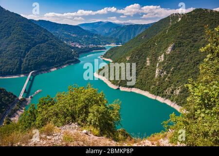 Piva Lake in Piva Canyon, town of Pluzine in dist, from road descending from Pivska Planina (Piva Plateau) and Durmitor mountains, Montenegro Stock Photo