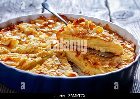 A Slice Of Invisible Apple Cake Gateau Invisible On A Cake Shovel In A Round Baking Shell On A Wooden Table French Cuisine Vertical View From Above Stock Photo Alamy