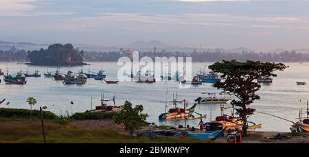 Early morning light over Fisherman's Bay, Welgama, looking towards Mirissa on the south coast of Sri Lanka. Stock Photo