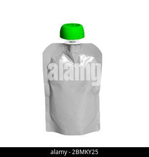 White empty plastic doy pack with spout and round green lid, for baby food, fruit puree, snack on the go, isolated on a white background Stock Photo