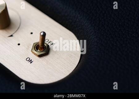 On off switch button on speaker bluetooth Stock Photo