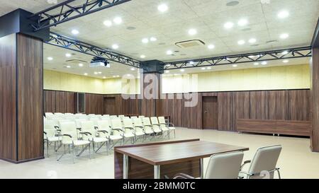View from table for speaker to audience with chairs Stock Photo