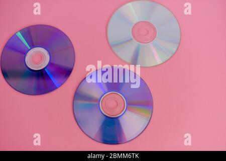 Music disc isolated against colorful background Stock Photo