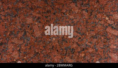 Panoramic red granite surface. Texture background for graphic applications Stock Photo