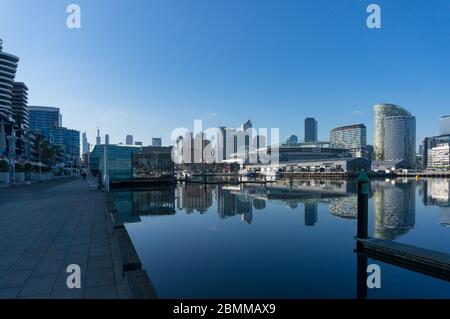 Melbourne, Australia - June 14, 2017: Modern cityscape with highrise waterfront buildings. Luxury comemrcial and residential property in Docklands, Me Stock Photo