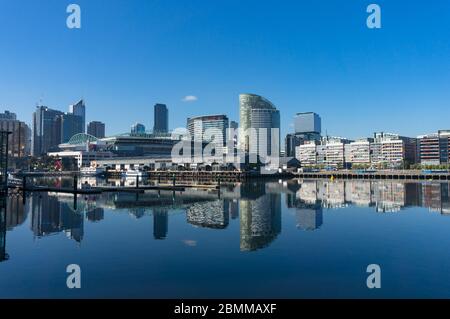 Melbourne, Australia - June 14, 2017: Modern cityscape with highrise waterfront buildings. Luxury comemrcial and residential property in Docklands, Me Stock Photo