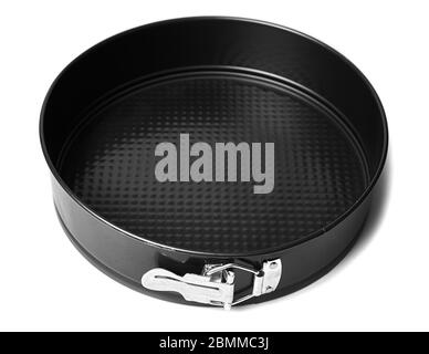 Round metal baking dish, isolated. Baking form with removable bumpers. Stock Photo