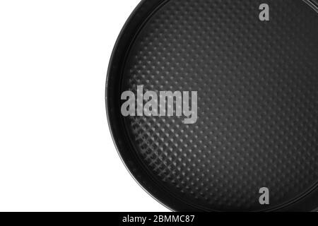 Round metal baking dish, isolated. Baking form with removable bumpers. Stock Photo