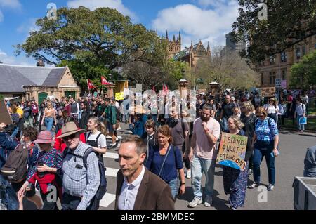 Sydney, Australia - September 20, 2019: People with banners and placards going to protest Stock Photo