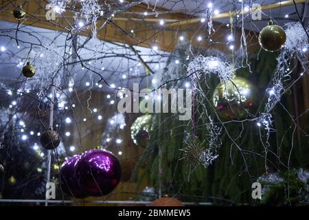 Christmas tree decorations with balls and lights Stock Photo