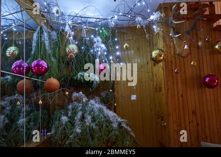 Christmas tree decorations with toys hanging on the branches Stock Photo