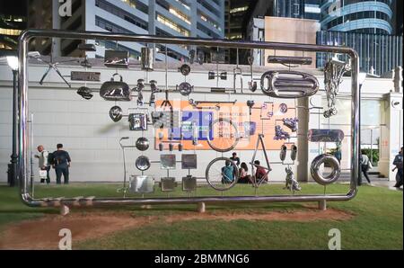 Singapore-city-SINGAPORE-0024Oct212019 Art installation in downtown Singapore. Metal frame with every day objects suspended from frame. Stainless stee Stock Photo