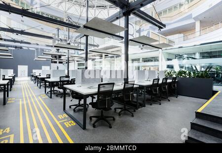 Big rental office with wrapped computers, no workers Stock Photo