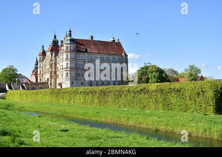 Medieval castle in the park in Gustrow, Germany Stock Photo