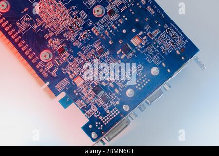 gpu Graphics Proccesing Unit white background on white background details macro blue red light chip Stock Photo