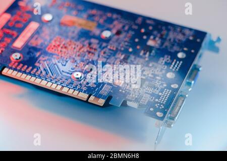 gpu Graphics Proccesing Unit white background on white background details macro blue red light chip Stock Photo