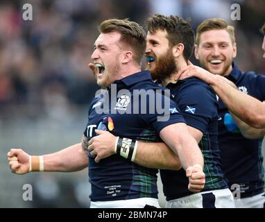 February 27th 2016, RBS Six Nations, Italy v Scotland Stadio Olimpico, Rome. Stuart Hogg (L) celebrates with try scorer Tommy Seymour and Finn Russell Stock Photo