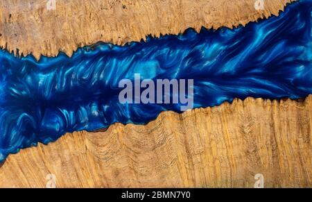 Casting epoxy resin Stabilizing maple wood background texture Stock Photo