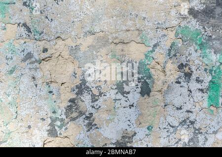 Texture, background of the old concrete wall with cracks and peeling paint Stock Photo