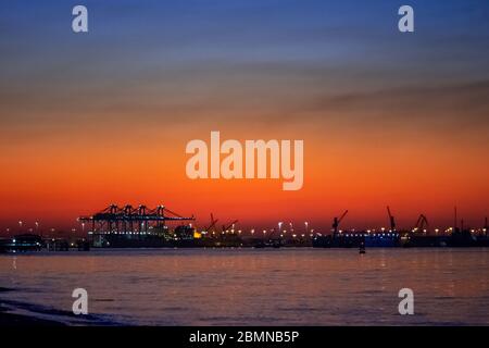 Amazing and colorful sunset above Shuwaikh beach Stock Photo