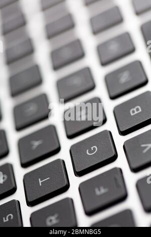 Close up computer keyboard keys with bokeh effect shallow depth of field Stock Photo