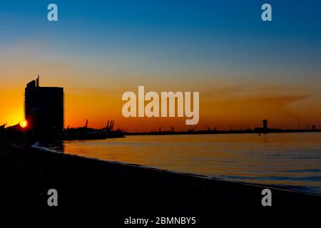 Amazing and colorful sunset above Shuwaikh beach Stock Photo