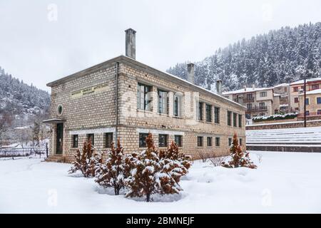 Snow winter landscape in village of Korischades, near Karpenisi town, in central Greece, Europe. Stock Photo