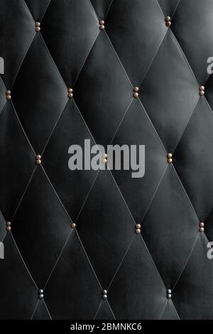 Soviet soft black dermantine front door with a banner of fishing line and nails - full frame background and texture Stock Photo