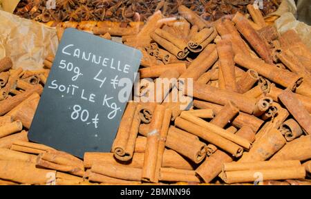 Nice, France, 25th of February 2020: Cinnamon sticks for sale at the market Stock Photo