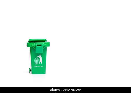 Green garbage, trash bin isolated on white background Stock Photo