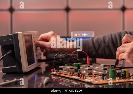 PCB witch microcontroller in electronics laboratory Stock Photo