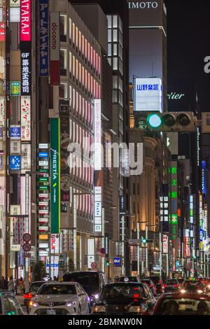 Tokyo / Japan - April 19, 2018: Neon advertisement lights of the trendsetting Ginza shopping area in central Tokyo, Japan