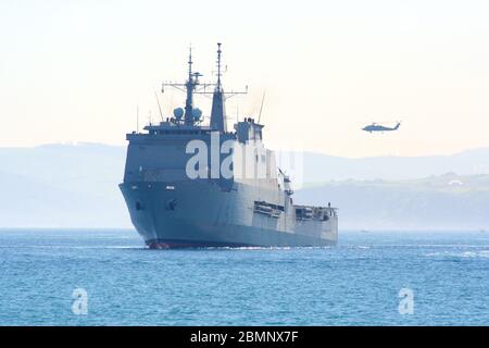 Series 25 of 165 Spanish ship Galicia (L51) with Sikorsky SH-60 Seahawk approaching at Armed Forces Day Santander Spain Stock Photo