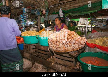 Bagan Myanmar October 29 2013; locals and vendors in shop selling typical Burmese natural fresh food