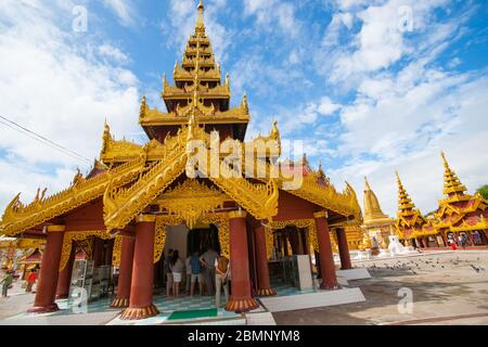 Bagan Myanmar - October 29 2013; ornates architectural facades of Buddhist Shwezigon Pagoda and monastery.