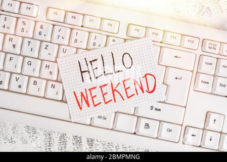 Writing note showing Hello Weekend. Business concept for Getaway Adventure Friday Positivity Relaxation Invitation Keyboard office supplies rectangle Stock Photo