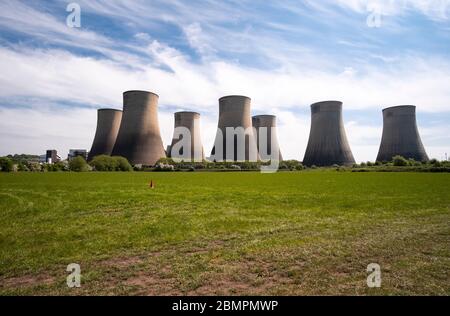 Concrete power station cooling towers background Stock Photo