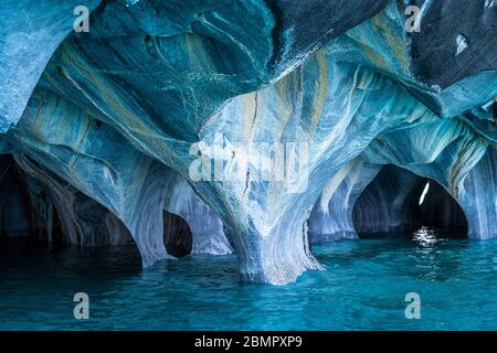 The Marble Caves (Spanish: Cuevas de Marmol ), a series of naturally sculpted caves in the General Carrera Lake in Chile, Patagonia, South America. Stock Photo