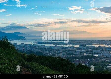 Japanese countryside aerial sunset landscape with tea plantations, mount Fuji and sea. Drone view of Shizouka, Japan Stock Photo