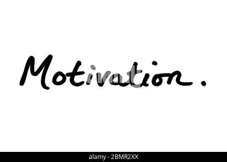 Motivation handwritten on a white background. Stock Photo